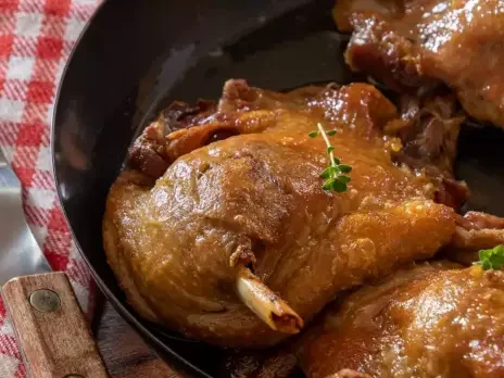 At the table: <em> Confit de canard</em>